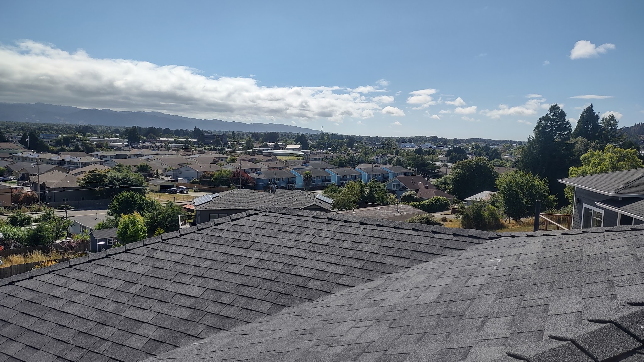Roofline view of a finished Collings Construction project overlooking Fortuna